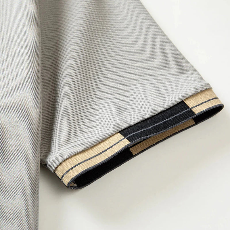 Valenco – Herrepolo med elegante detaljer